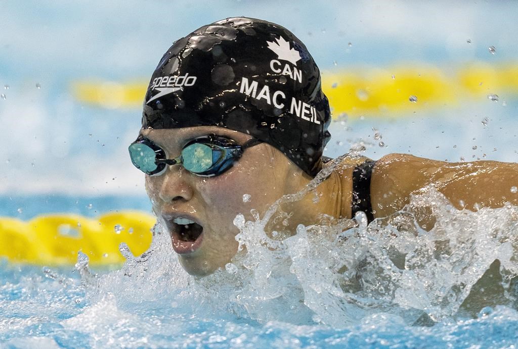 Maggie Mac Neil wins silver in the 100m butterfly at World Aquatics